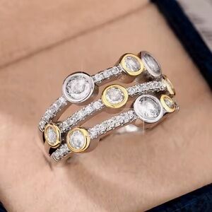 Elegant Gold and Silver Multi-Band Ring
